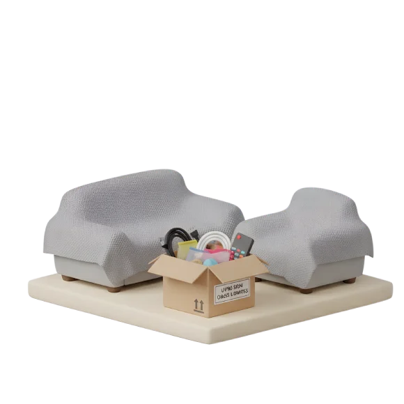 Living room furniture covered and electronics packed in labeled boxes for safe storage