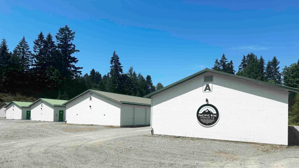 Pacific Rim Storage Mill Bay facility with secure drive-up storage units surrounded by Vancouver Island trees.